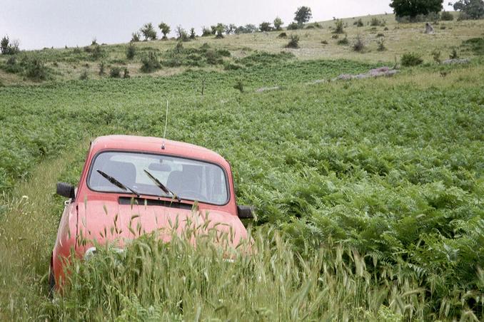 Car and road back to village