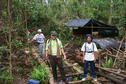 #3: Barrie, Tom, and Sangkot Rifai (l-r) on the logging trail at a logger’s rest camp.