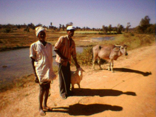 Villagers on the road leading to 13N76E