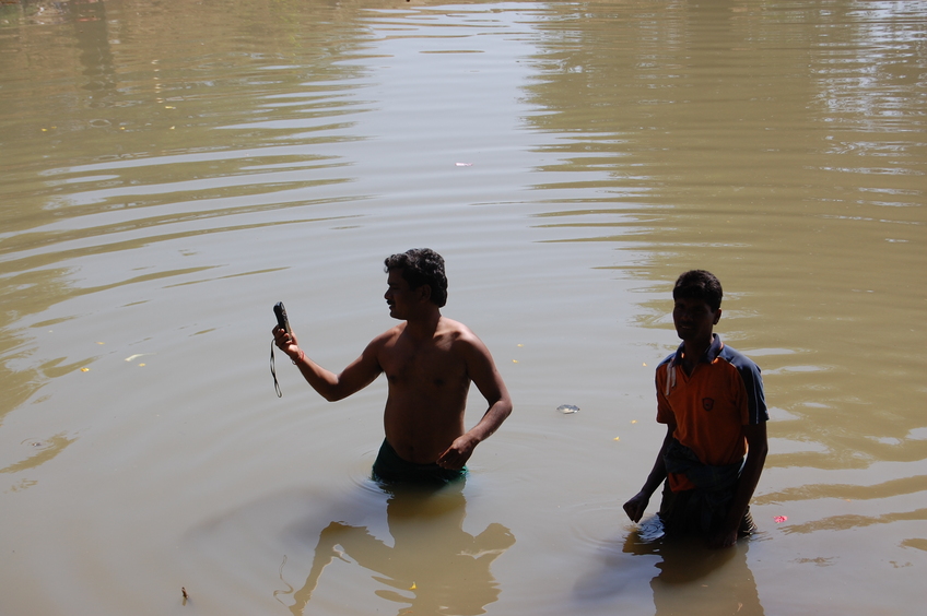 Kasinath skinny dipping in the village pool in his quest for the zeroes