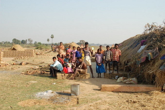 Clay brick makers at the river bank