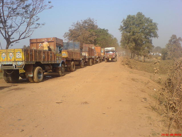 Road to the point - choked with trucks moving iron ore