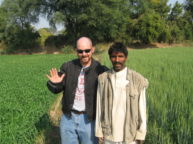 Doug and Anil, a local farmhand