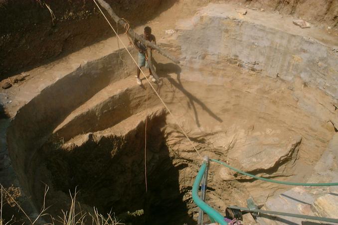 The 50 feet deep well bored in grey schist