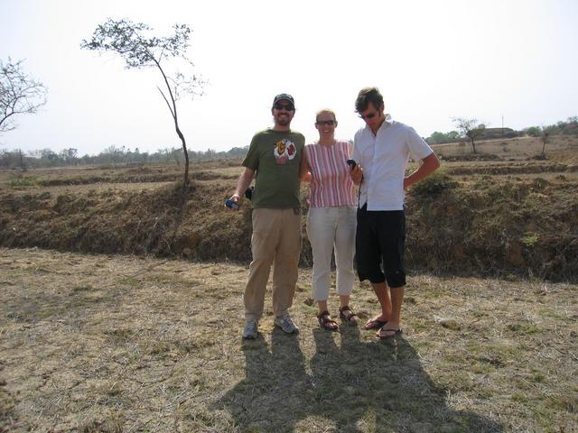 Warren, Tricia and Mark standing on the confluence point