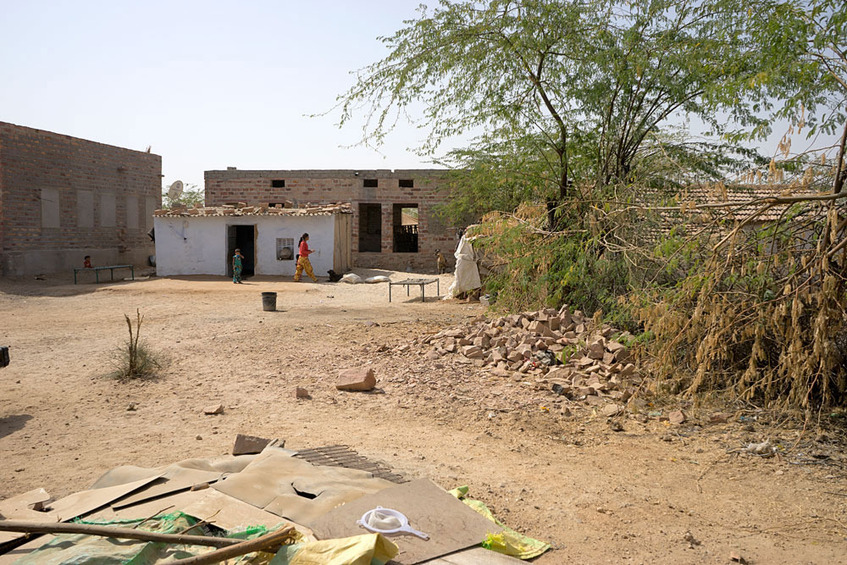 View to the South from the Confluence (The white building is the family's home.)