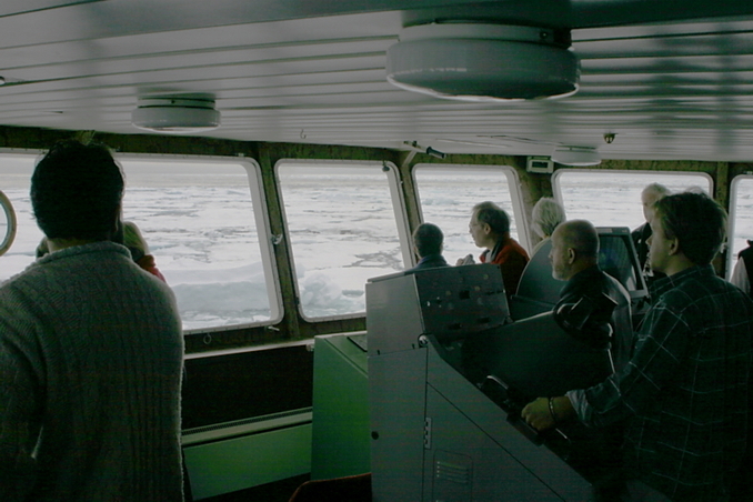 Captain navigating ship in pack ice