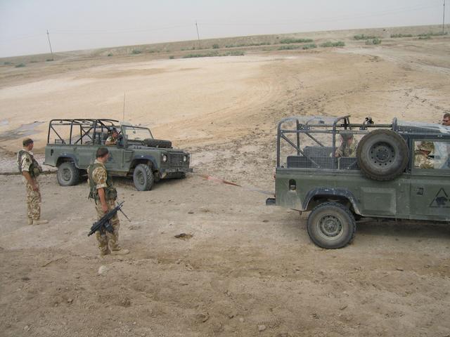 The bogged-in land rovers