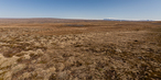 #7: View from highway 1 2.9 km from CP, across Holtavörduheidi, Eiríksjökull and Langjökull in the southeast