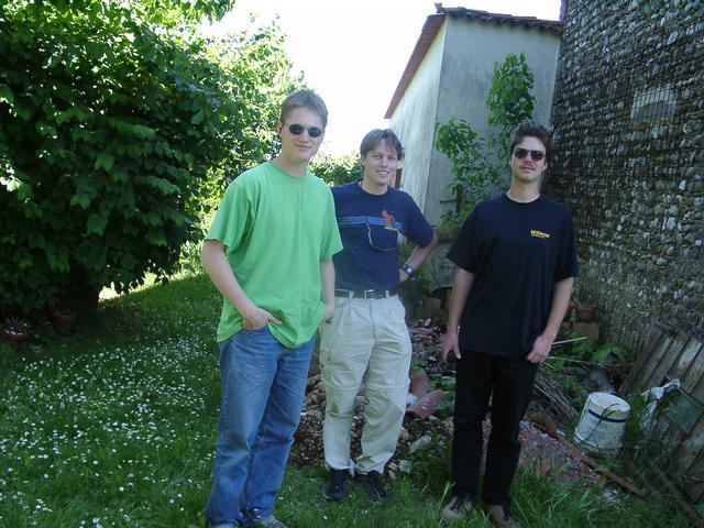 Basti, Christoph and Michael at the confluence point (corner of the house)