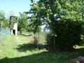 #5: View to the East, where we came from. On the right side inside the fence is the gas tank.