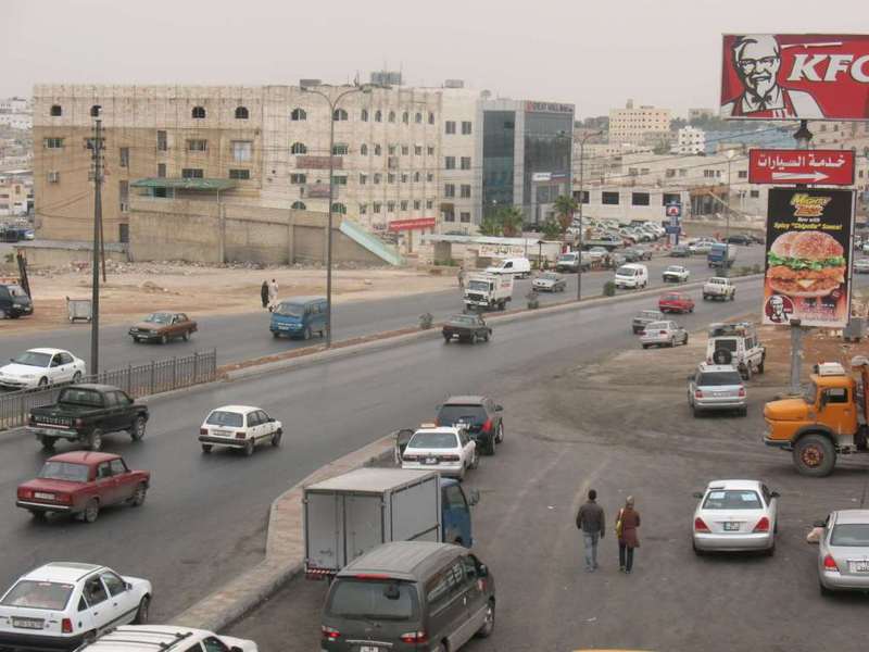 General view from the pedestrian bridge towards the Confluence, which is in just front of the building in the upper left half of the photo.