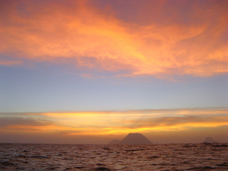 A breathtaking sunset on the approach to Yokoate-jima.  Worried about typhoon waves and landing possibilities on a wild island in the pitch darkness that would soon envelop us, we were nearly oblivious to the beauty around us and later didn't even remembe