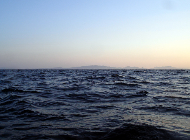 A view of the ocean over the confluence, looking northeast.  Naga Island is visible, 17km distant.