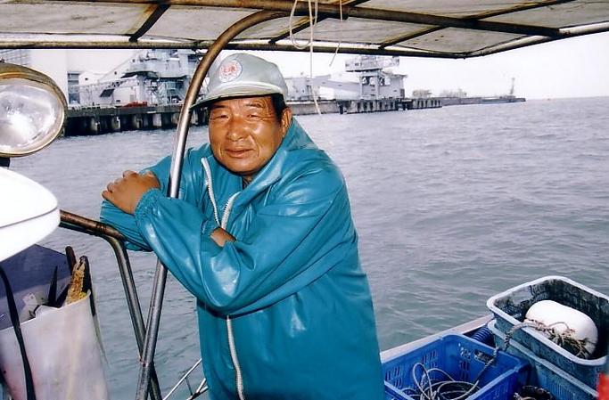 Captain with view of confluence behind