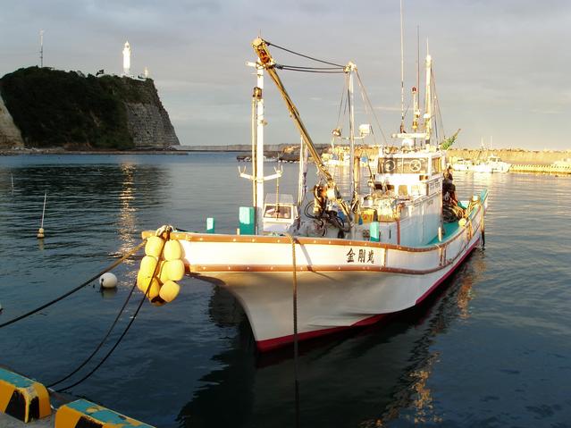 Toyoma lighthouse and the ship