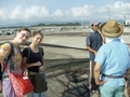 #8: Kathi and Anna talking to the fishermen busy mending their nets