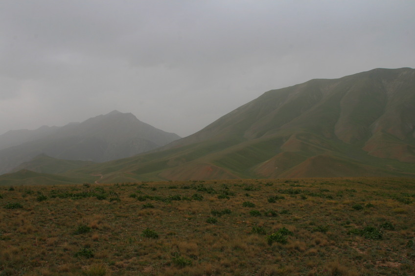 View West: Track to Këkdzhar Pass and mountain Tyuyekuyruk