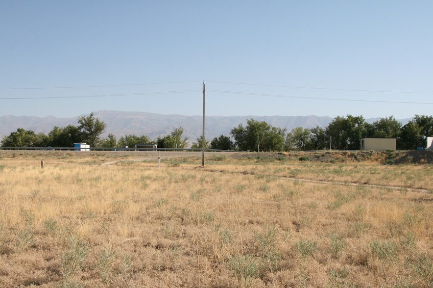 View South: Bus stop and Kirgizskiy Mountains