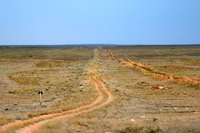 solid dam runs parallel to the tracks