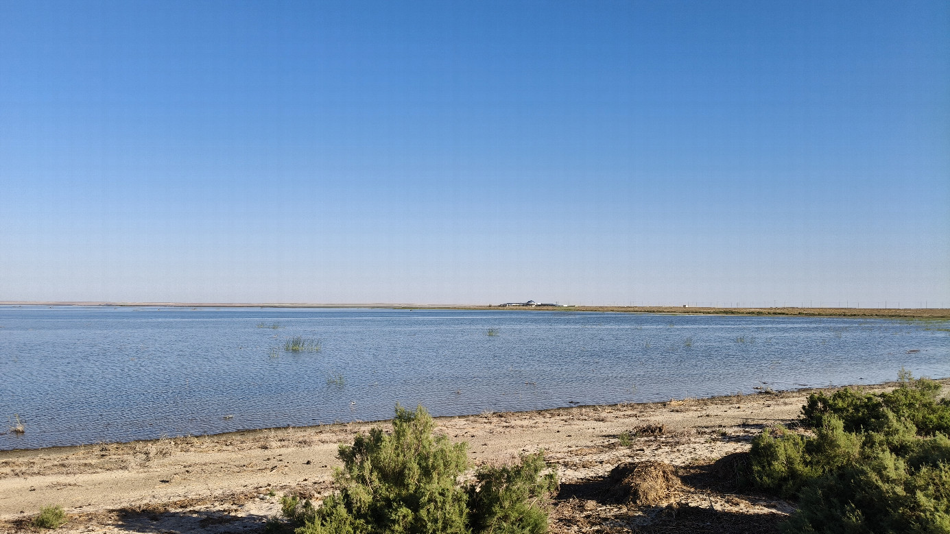 Kamastybas lake. Recreation zone at the distance