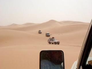 #1: Toyota convoy in the last of the dunes in a N-S crossing of the Awbāriy Sand Sea