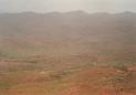 #2: View from the top of the cliff into the valley of the Asif n-Ayt Mūsā (Confluence close to the white minaret in the lower right corner)