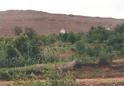 #9: Village Tizi n-Girin above the Confluence, 300 m high cliff in the background