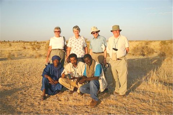 Group photo (Howe-Kelley-Lees) on site, with Tuareg guide and drivers