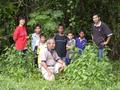 #4: Children living around the area were curious and had their picture taken with us with the Confluence as background