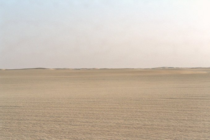 View to the south. Small dunes at the horizon.