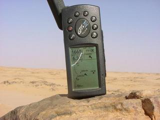 #1: Looking east from the top of the ridge of cliffs east of Dirkou toward the Confluence