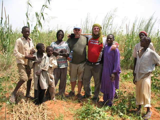 Udo, Helmut, and some villagers at the Confluence