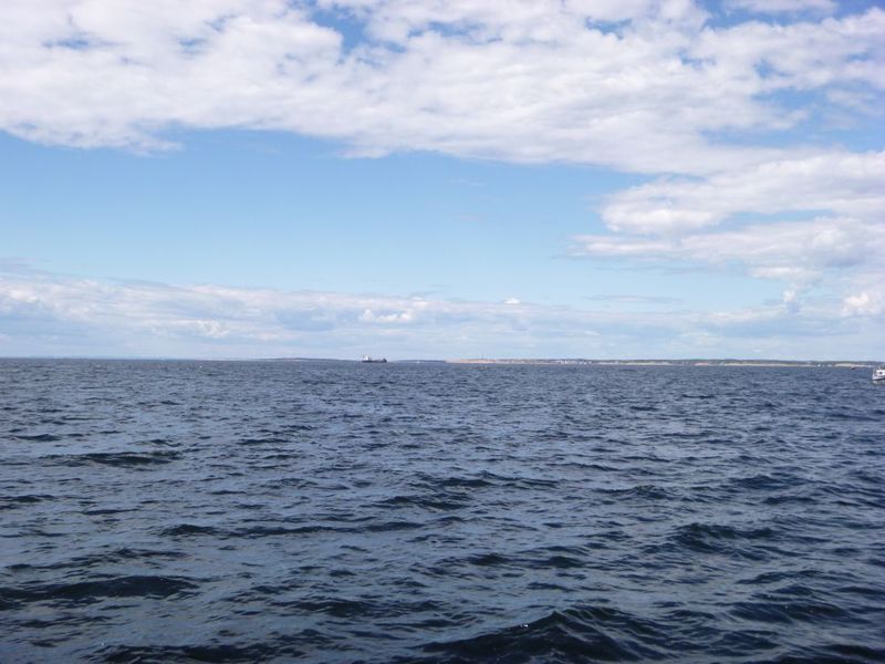 Westerly view from confluence point with the cargo ship CSL ELBE anchoring south of Rod island