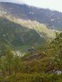 #5: View from the north end of the valley of the confluence, down to the valley below, the farm Vollset, the start of Flovegen over to Strynevannet