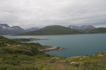 #1: The confluence point lies in the water 340 meters away, just beyond the rocky point in the foreground