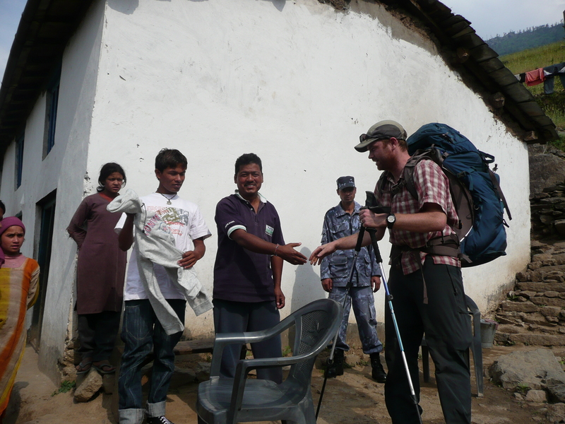 At the police station.  Manesh (left, in white), Mr. Sunar (center, in blue), Mitch (right)