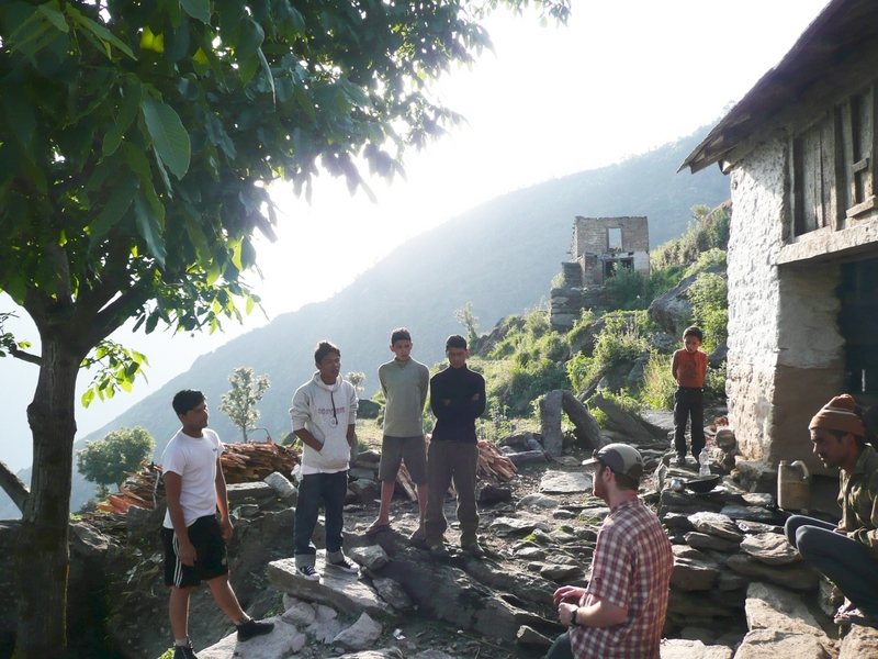 The village of Naji, the closest we got to the confluence.  Manesh in white sweatshirt across on left, Mitch in plaid on right