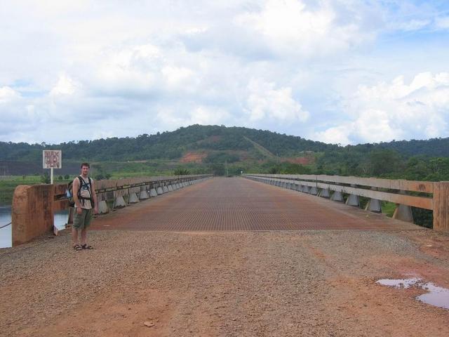 Steve Crossing the bridge over the hydro dam outflow (confluence in the distance)