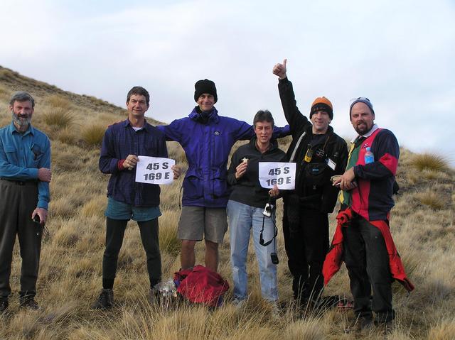 Murray Ellis, Peter Arthur, Paul Arthur, Sally Brodie, Joseph Kerski, and Roger Palmer celebrate their ascent to 45 South 169 East!