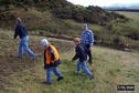 #3: Mr. Collie holds down one of many electric fence lines so we can scamper across.