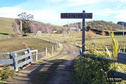 #6: Entrance to the property. Confluence is below the "N" on the sign.