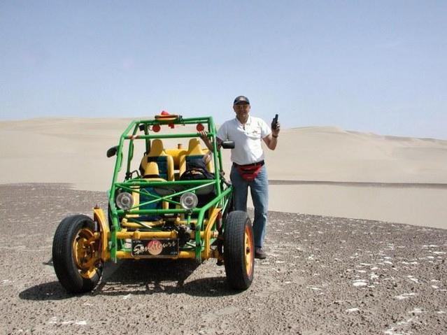 Mario next to his buggy.