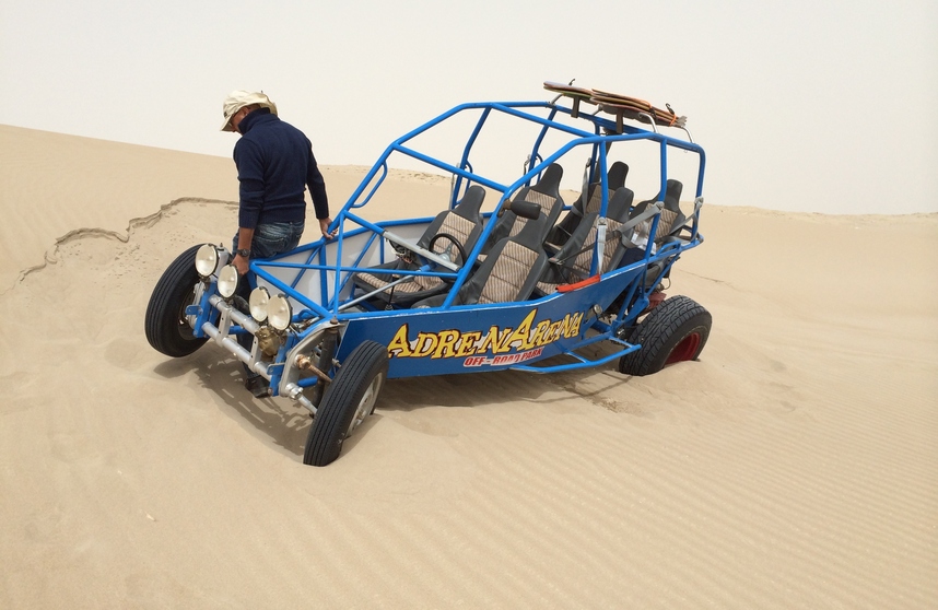 Mario unsticks the dune buggy (one of several instances)