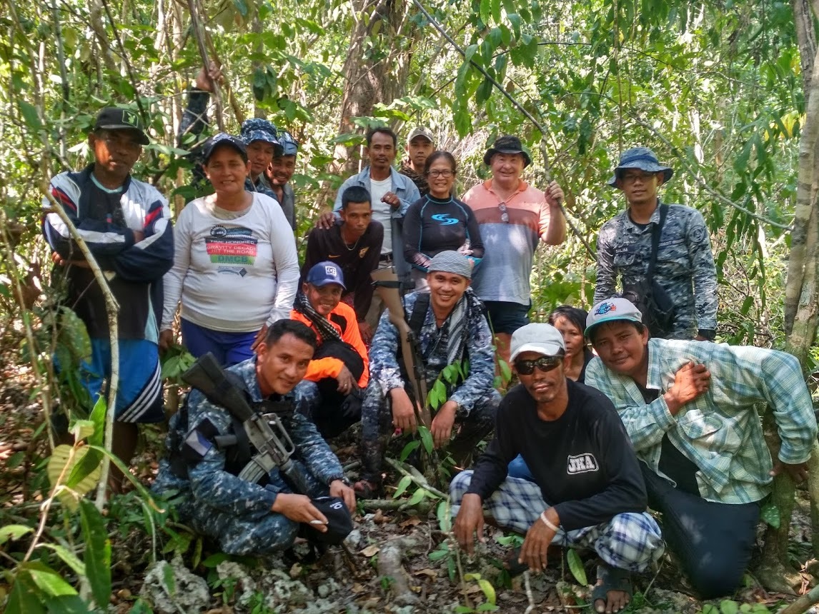 Mike & Bethilda Smith, LCDR Dagalea PCG Lt. Diciano PCG, Coastguard Escort and local curious villagers