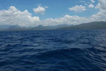 #1: Looking East to Panay Island 3.5 km away & the 11N 122E confluence at foreground