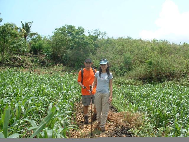 Raul and Jane passing through a farm