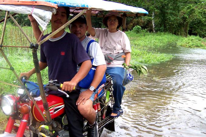 "Habal-Habal" ride we took to within 600 meters of the confluence spot. Riding is Dado & Santah. Vacant space is for me.