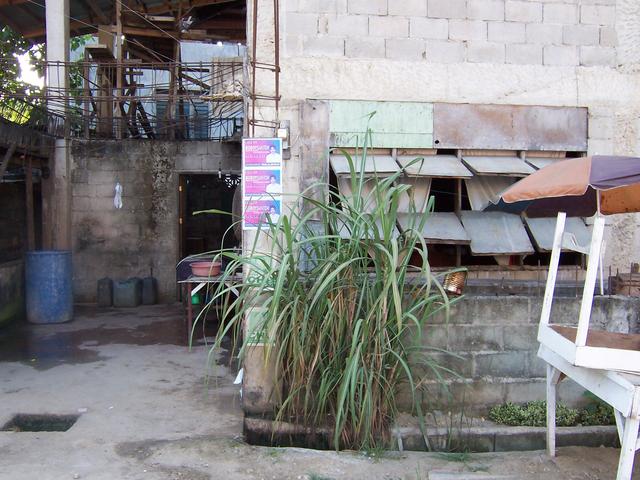 This unfinished house on the exact 12N 124E Confluence and looking East