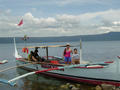 #6: Olma and Kristoff on the banca before our swim. This is a stylized lake version of the typical "outrigger" type boat. Larger and more rugged ocean versions are used throughout the Philippine’s 7,000 islands.